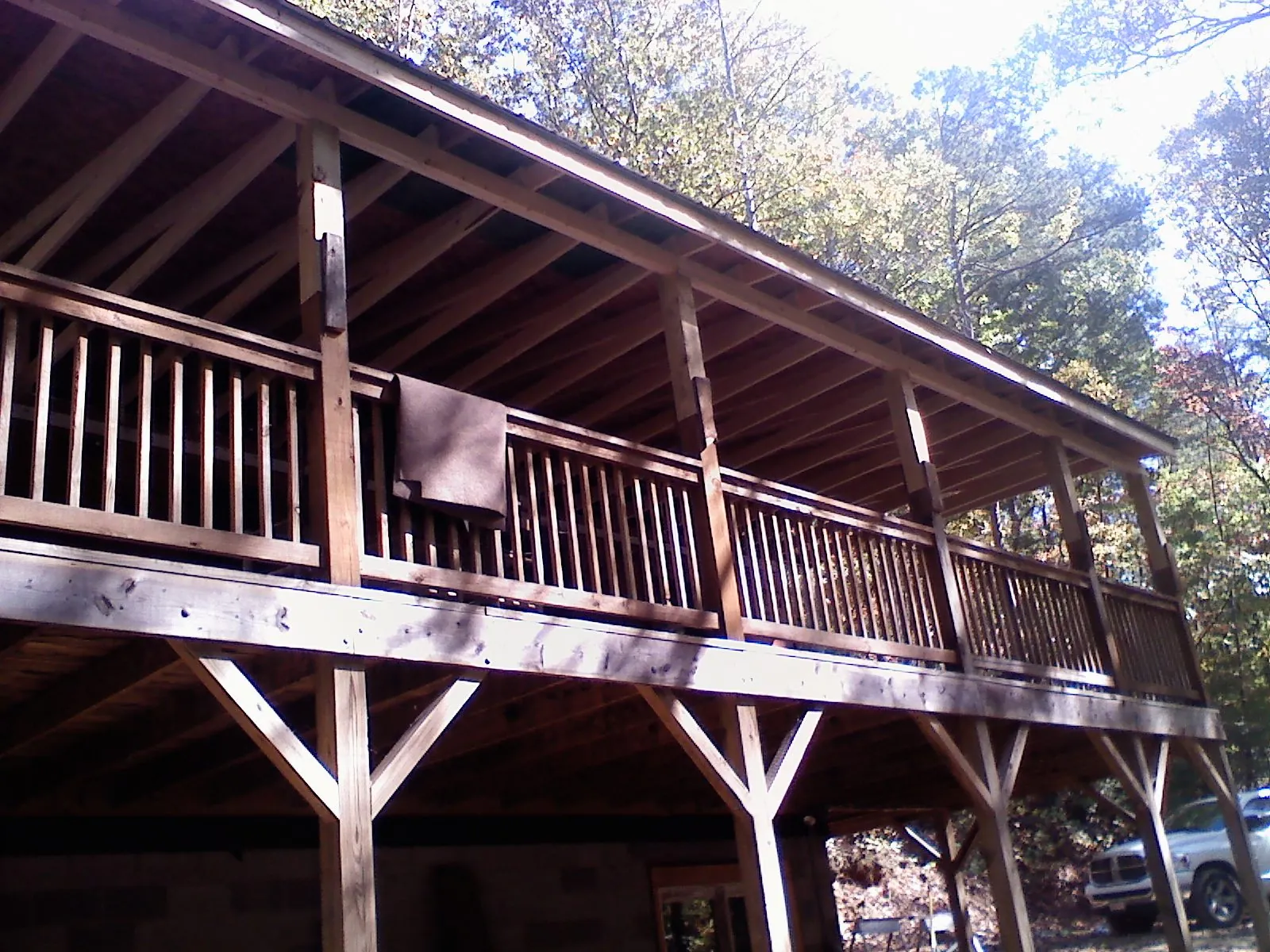 Timber framing under a new elevated porch and deck — Roof Leak Repair in Stockholm by Roofing Brothers